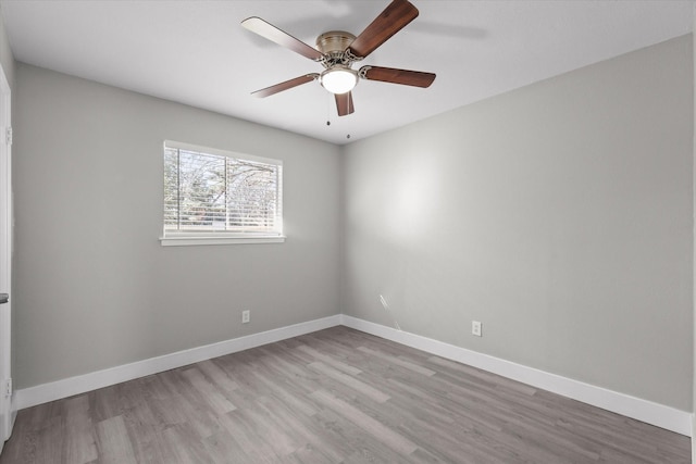 unfurnished room with ceiling fan and light hardwood / wood-style floors