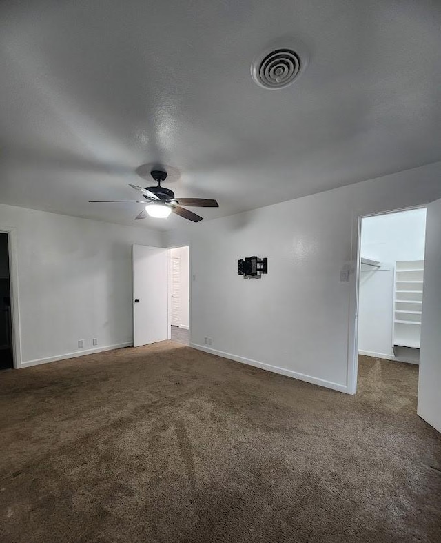 1911 College St, Gainesville, TX 76240 - spare room with ceiling fan, carpet flooring, and baseboards
