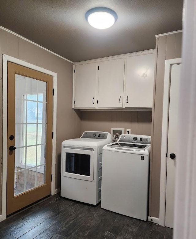 1911 College St, Gainesville, TX 76240 - washroom with cabinet space, independent washer and dryer, dark wood-style floors, and a textured ceiling