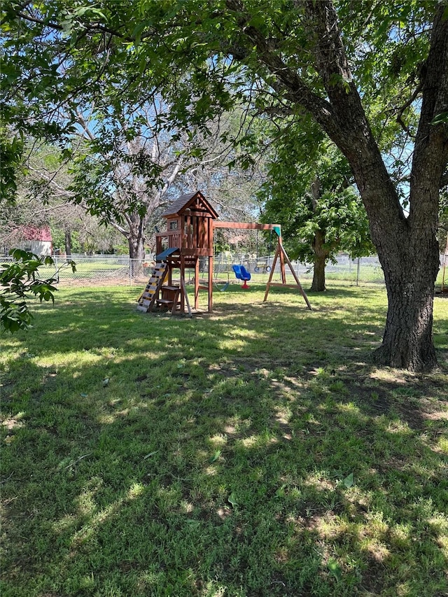 1911 College St, Gainesville, TX 76240 - view of yard featuring a playground