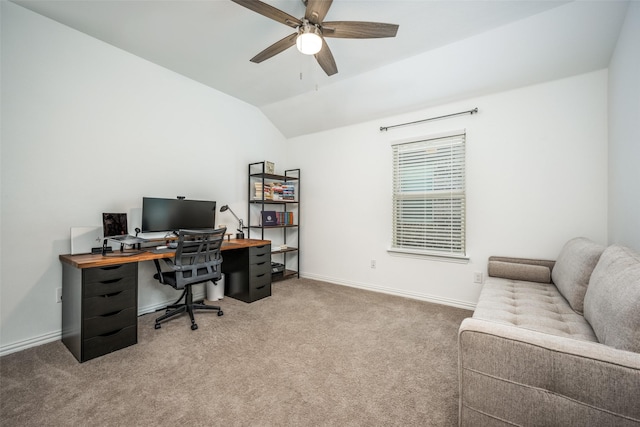 carpeted office featuring ceiling fan and vaulted ceiling