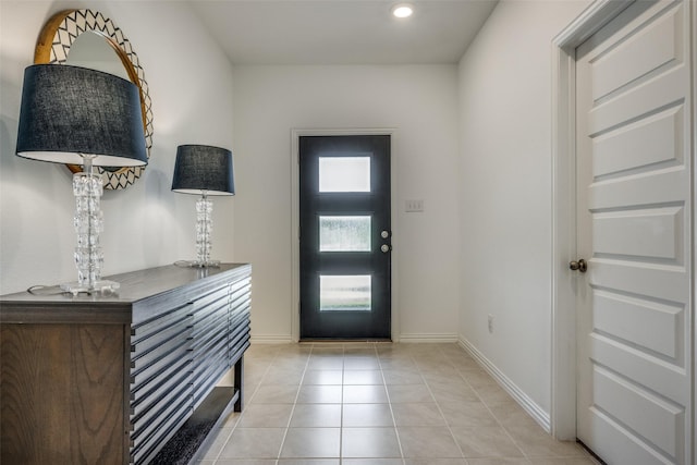 entryway featuring light tile patterned floors