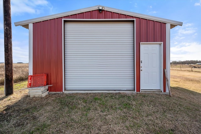 view of outbuilding featuring a garage