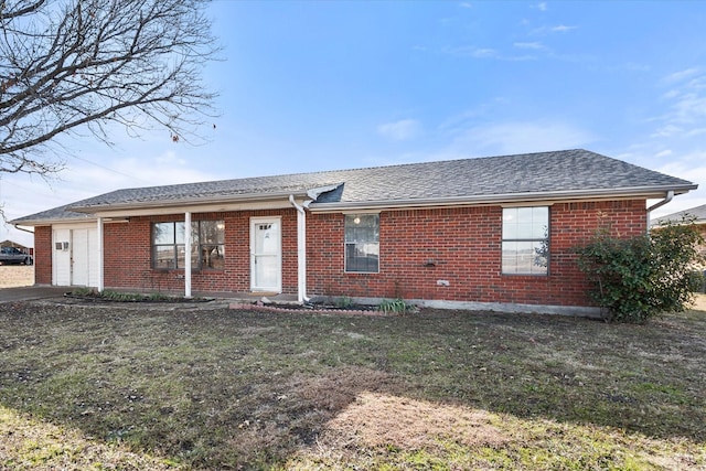 ranch-style house with a front lawn