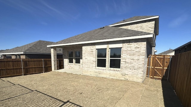 back of house featuring a patio