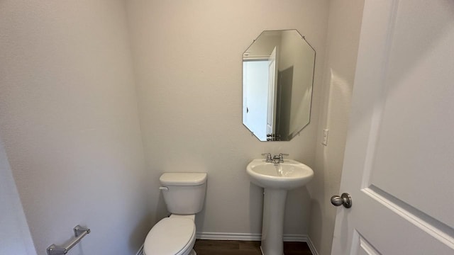 bathroom featuring toilet