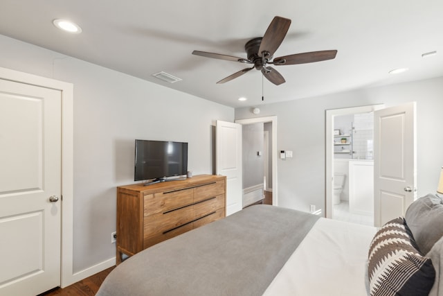 bedroom featuring ceiling fan, ensuite bathroom, and wood-type flooring