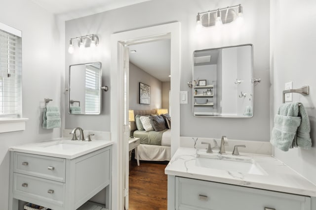 bathroom featuring vanity and hardwood / wood-style floors