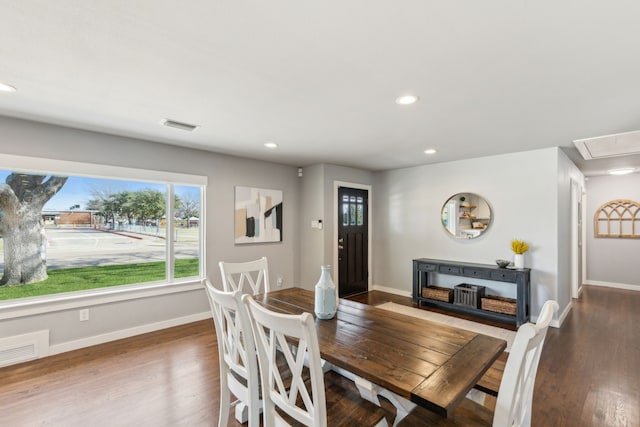 dining room with hardwood / wood-style floors