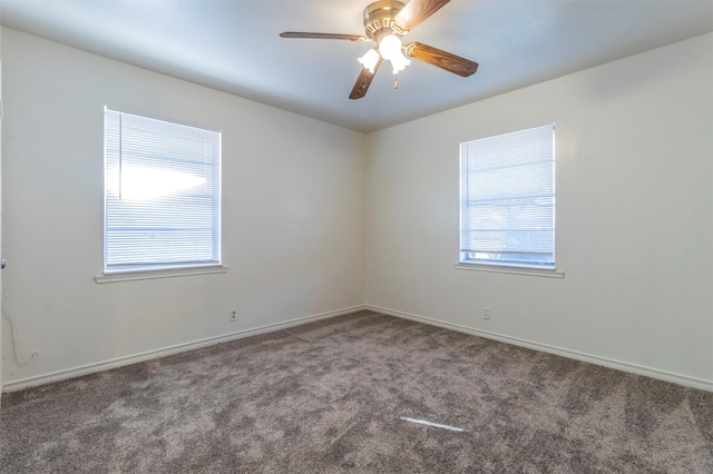 carpeted empty room with ceiling fan