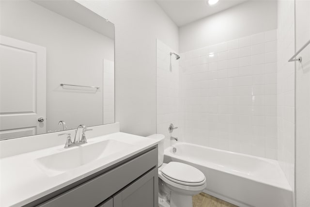 6721 Golden Grove Rd, Fort Worth, TX 76123 - full bath with toilet, shower / washtub combination, vanity, and wood finished floors