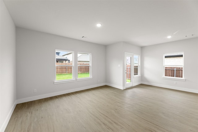 6721 Golden Grove Rd, Fort Worth, TX 76123 - empty room with wood finished floors, baseboards, and recessed lighting