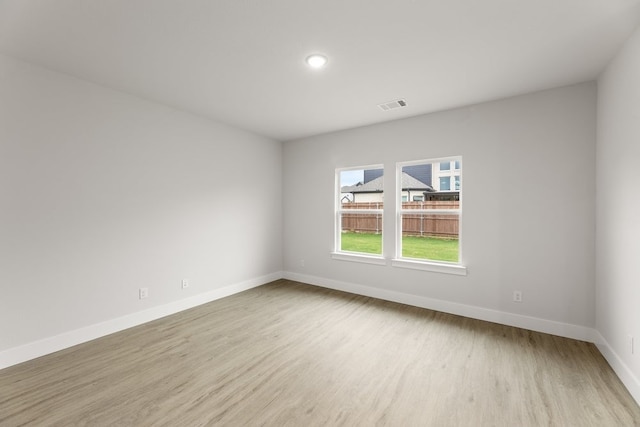 6721 Golden Grove Rd, Fort Worth, TX 76123 - unfurnished room featuring wood finished floors, baseboards, and recessed lighting