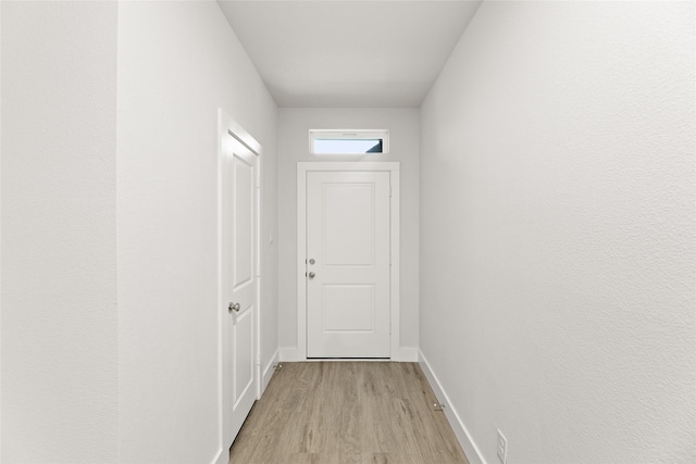6721 Golden Grove Rd, Fort Worth, TX 76123 - entryway featuring light wood-style flooring and baseboards
