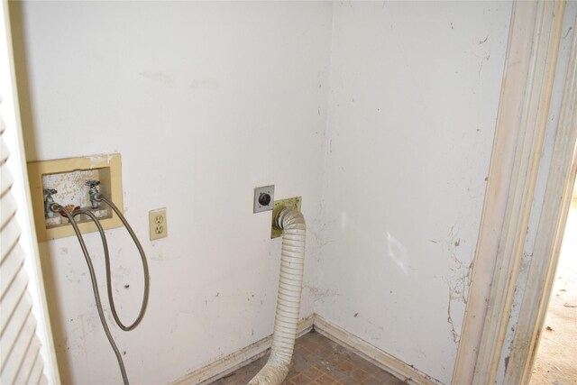 clothes washing area featuring hookup for a washing machine and hookup for an electric dryer