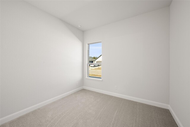 empty room with carpet floors