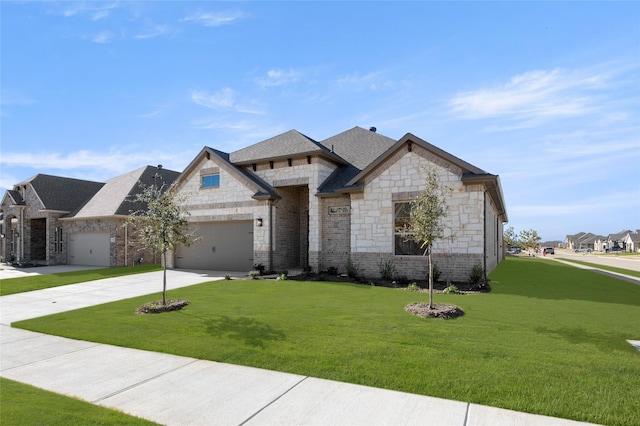 french country inspired facade featuring a front yard and a garage