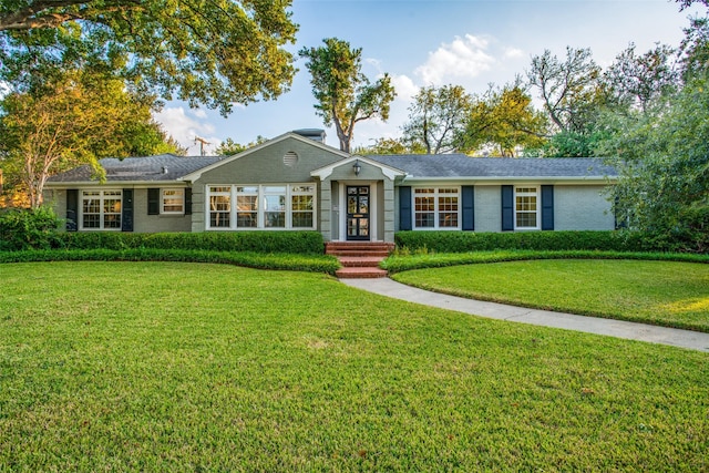 ranch-style house with a front yard