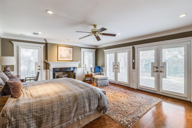 bedroom with access to exterior, hardwood / wood-style floors, ceiling fan, and ornamental molding