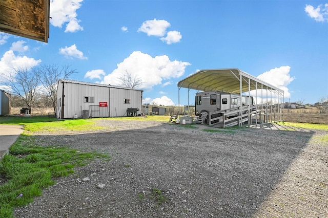 view of car parking featuring a carport