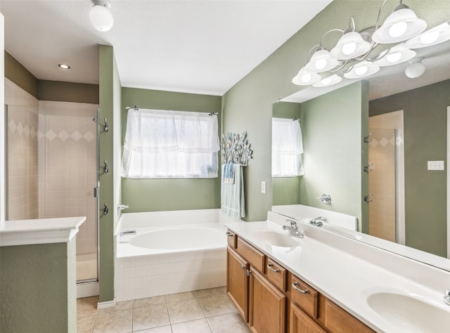 bathroom featuring vanity, tile patterned flooring, and independent shower and bath