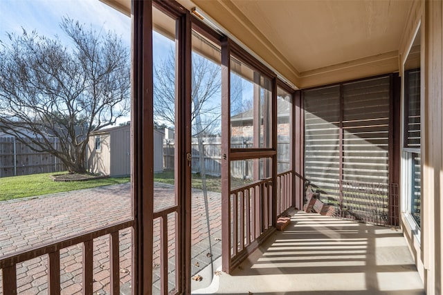 unfurnished sunroom with plenty of natural light