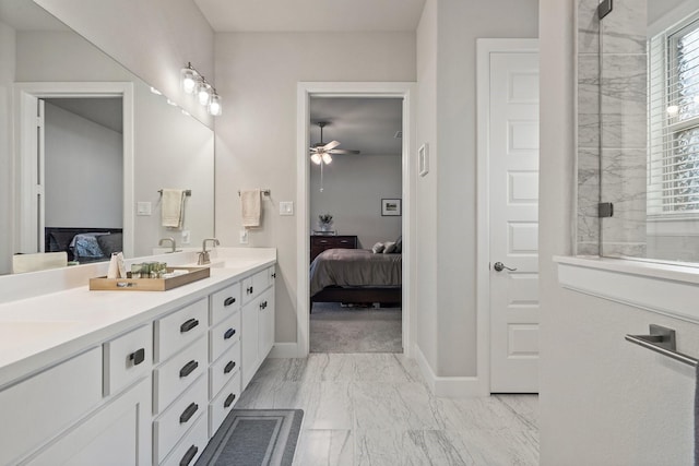 bathroom with ceiling fan and vanity