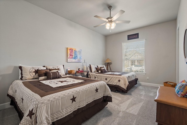 bedroom with ceiling fan and carpet floors