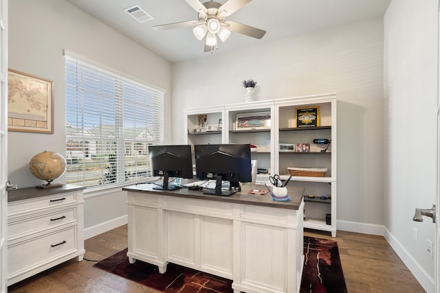 office space featuring dark wood-type flooring and ceiling fan