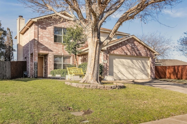 view of front of home featuring a front lawn and a garage