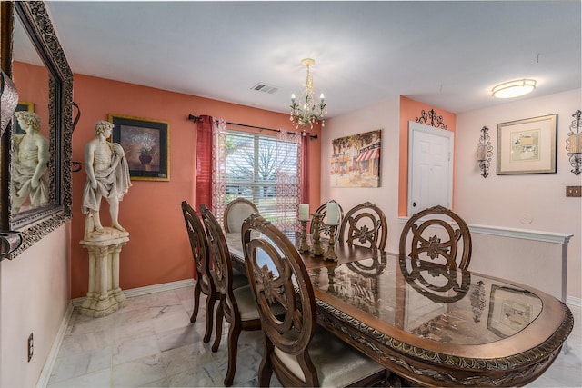 dining room featuring an inviting chandelier