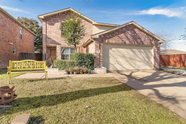 view of property with a front yard and a garage