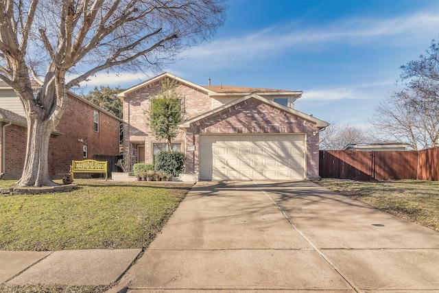 view of front of house with a front yard and a garage