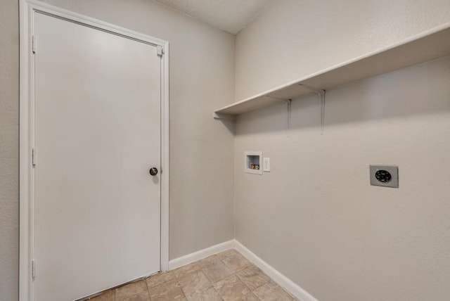 laundry room with a textured ceiling, hookup for a washing machine, and hookup for an electric dryer