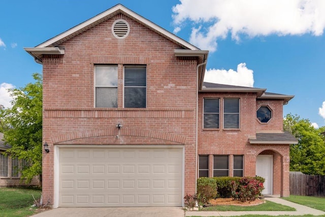 front of property with a garage