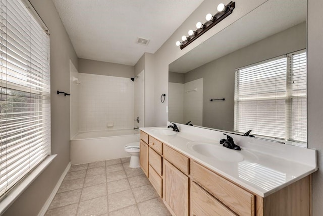 full bathroom with shower / bath combination, vanity, and toilet