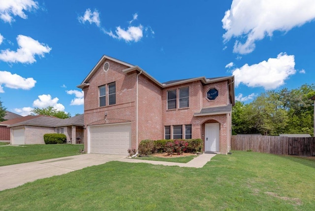 front of property featuring a front yard and a garage