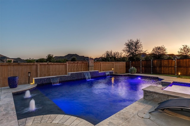 view of pool featuring a patio area, a fenced backyard, and a fenced in pool