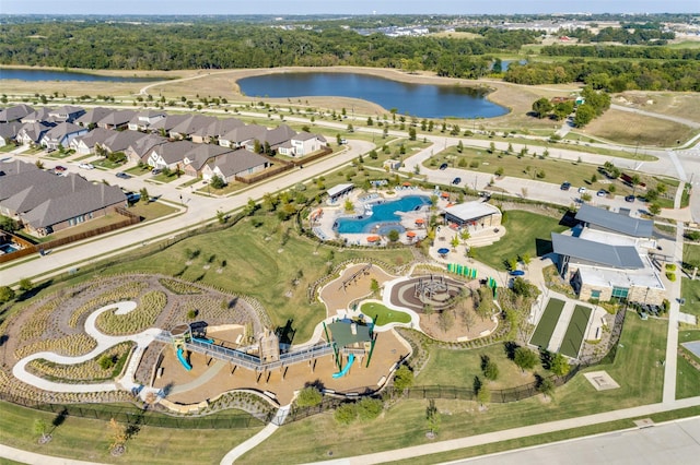 aerial view with a residential view and a water view