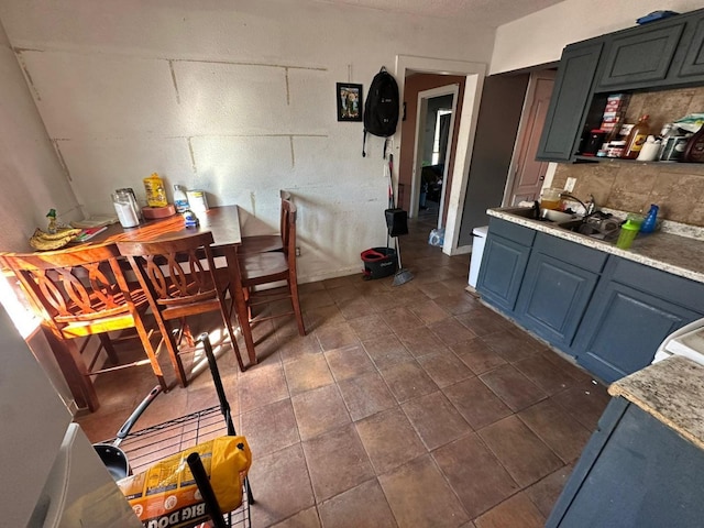 dining space featuring sink