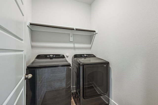 laundry area with washer and clothes dryer