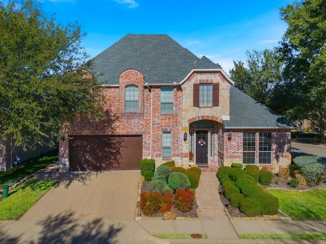 view of front of property with a garage