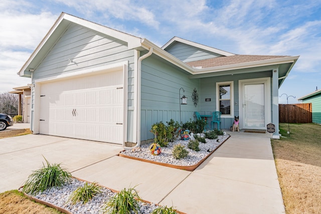 single story home with a garage