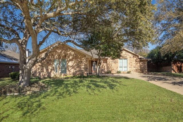 ranch-style house with a front yard