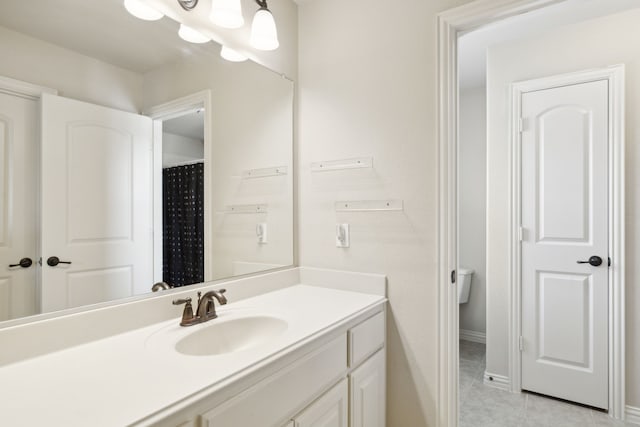 bathroom featuring vanity and tile patterned flooring