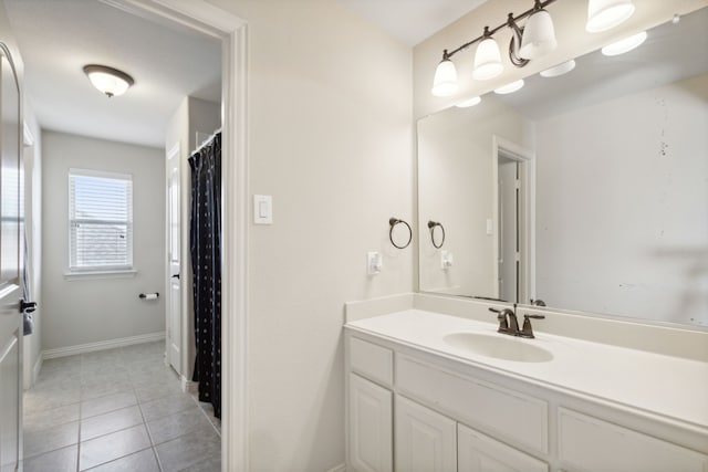 bathroom featuring tile patterned floors and vanity