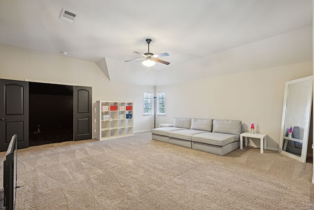 unfurnished living room with light carpet and ceiling fan