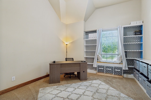 office space featuring lofted ceiling and carpet flooring