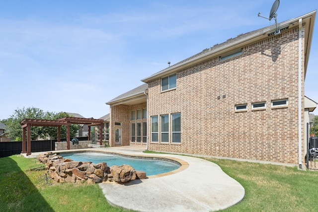 rear view of property featuring a patio, a lawn, a fenced in pool, and a pergola