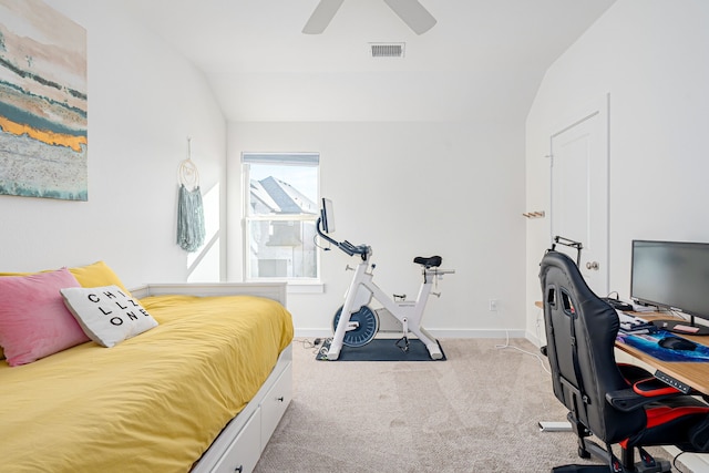 carpeted bedroom featuring ceiling fan and lofted ceiling